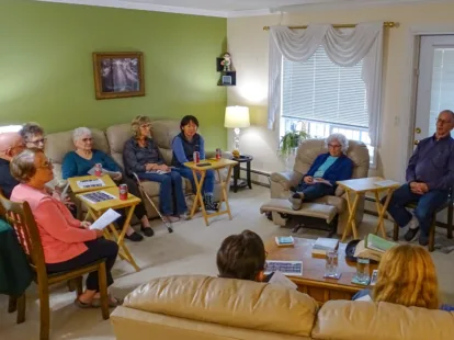 Group of seniors sitting in a circle studying the Bible