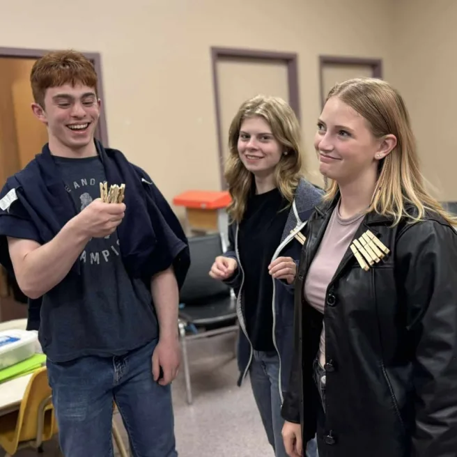 A few youth members doing an activity